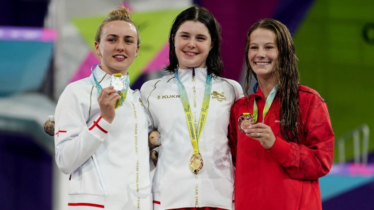 England's Andrea Spendolini Sirieix with her Gold Medal, center, England's Lois Toulson with her Silver Medal, left, and Canada's Caeli McKay with her Bronze Medal after the Women's 10m Platform Final during the Commonwealth Games at Sandwell Aquatics Centre, Birmingham, England, Thursday, Aug. 4, 2022. (Mike Egerton/PA via AP)