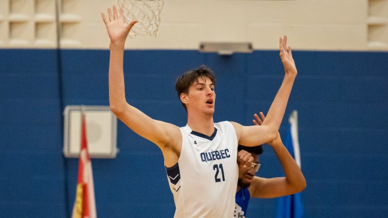 Team Quebec's Olivier Rioux plays in a men's basketball quarterfinal game against Team Alberta at the 2022 Canada Summer Games in Welland, Ontario Thursday, August 11, 2022. The 16-year-old Terrebonne, Quebec native is 7-foot-6 and recognized by Guinness World Records as the tallest teen in the world. (Tara Walton/CP)