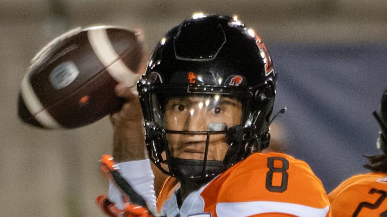 B.C. Lions quarterback Vernon Adams Jr. (8) passes against the Montreal Alouettes during first half CFL football action in Montreal on Friday, September 9, 2022. (Peter McCabe/THE CANADIAN PRESS)