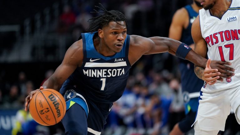 Minnesota Timberwolves forward Anthony Edwards (1) drives on Detroit Pistons guard Rodney McGruder (17) in the first half of an NBA basketball game in Detroit, Thursday, Feb. 3, 2022. (Paul Sancya/AP)