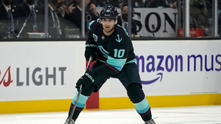 Seattle Kraken center Matty Beniers (10) looks to pass against the San Jose Sharks during the first period of an NHL hockey game, Friday, April 29, 2022, in Seattle. (Ted S. Warren/AP Photo)