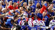 Diggs scores three touchdowns for Bills in rout of Titans