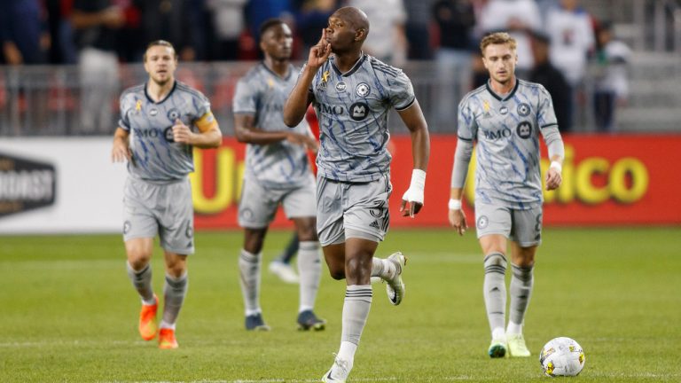 CF Montreal defender Kamal Miller, centre, could earn his club some money if he makes Canada's World Cup roster. (Cole Burston/CP)