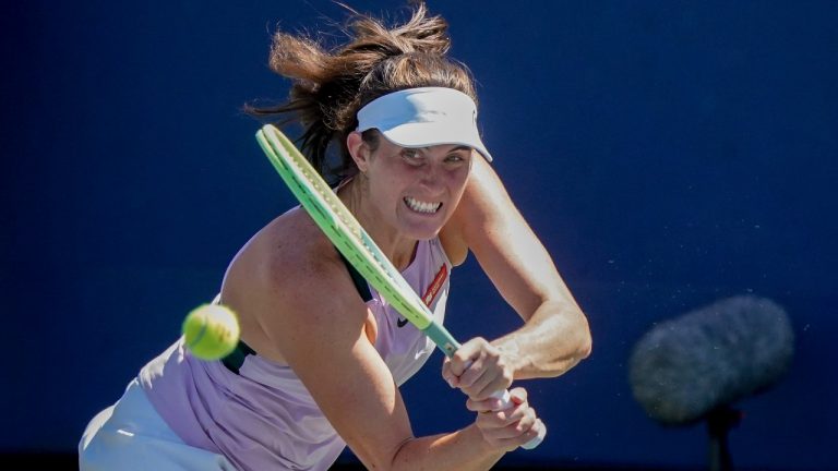 Rebecca Marino, of Canada, returns a shot to Zhang Shuai, of China, during the third round of the U.S. Open tennis championships, Friday, Sept. 2, 2022, in New York. (AP)