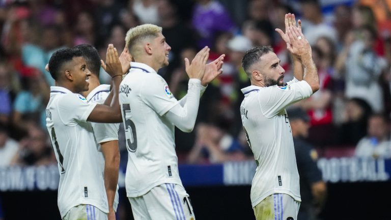 Real Madrid players applaud to supporters at the end of the Spanish La Liga soccer match between Atletico Madrid and Real Madrid at the Wanda Metropolitano stadium in Madrid, Spain, Sunday, Sept. 18, 2022. Real Madrid won 2-1. (Manu Fernandez/AP)