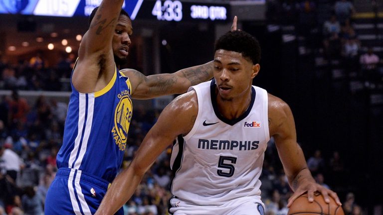 Memphis Grizzlies forward Bruno Caboclo (5) is defended by Golden State Warriors forward Alfonzo McKinnie (28) during the second half of an NBA basketball game Wednesday, April 10, 2019, in Memphis, Tenn. (Brandon Dill/AP Photo)