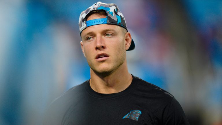 Carolina Panthers running back Christian McCaffrey watches during the first have of an NFL preseason football game against the Buffalo Bills on Friday, Aug. 26, 2022, in Charlotte, N.C. (Jacob Kupferman/AP)