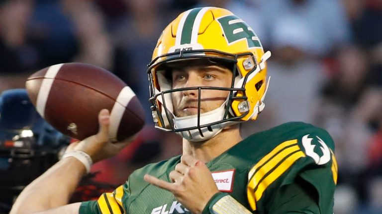 Edmonton Elks quarterback Taylor Cornelius (15) throws the ball during first half CFL action against the Ottawa Redblacks in Ottawa on Friday, August 19, 2022. (Patrick Doyle/THE CANADIAN PRESS)