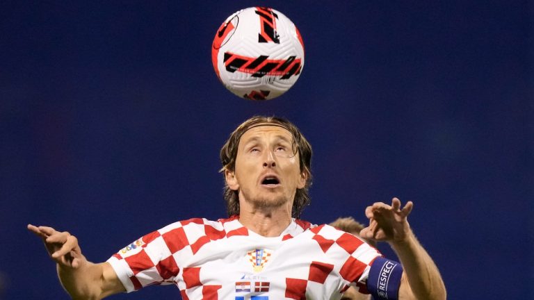 Croatia's Luka Modric heads the ball during the Nations League group A soccer match between Croatia and Denmark at the Maksimir stadium in Zagreb, Croatia, Thursday, Sept. 22, 2022. (Darko Bandic/AP Photo)