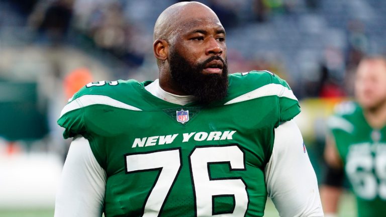 New York Jets offensive lineman George Fant looks on after an NFL football game against the New Orleans Saints, Dec. 12, 2021, in East Rutherford, N.J. Fant is helping raise money to aid the relief efforts for his hometown of Bowling Green, Ky., one of many towns across several states ravaged by deadly tornadoes last week. (Matt Rourke/AP)