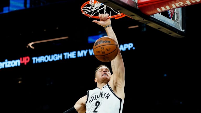 Brooklyn Nets forward Blake Griffin (2) dunks against the Phoenix Suns during the first half of an NBA basketball game, Tuesday, Feb. 1, 2022, in Phoenix. (Matt York/AP)