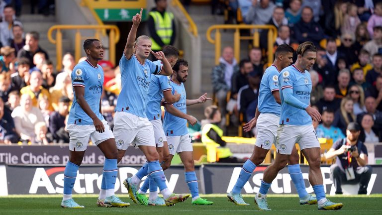 Manchester City's Erling Haaland celebrates scoring their side's second goal of the game during the English Premier League soccer match at Molineux Stadium. (Nick Potts/PA via AP)