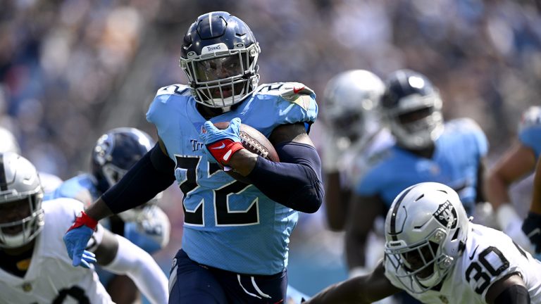 Tennessee Titans running back Derrick Henry (22) carries the ball against the Las Vegas Raiders in the first half of an NFL football game Sunday, Sept. 25, 2022, in Nashville, Tenn. (John Amis/AP)