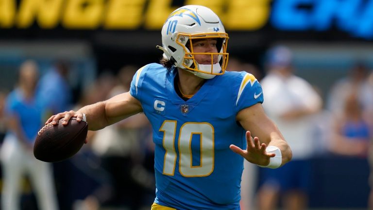 Los Angeles Chargers quarterback Justin Herbert (10) passes against the Las Vegas Raiders during the first half of an NFL football game in Inglewood, Calif., Sunday, Sept. 11, 2022. (Gregory Bull/AP)