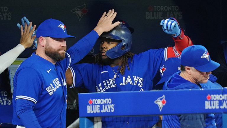 Toronto Blue Jays first baseman Vladimir Guerrero Jr. (27) celebrates his RBI sacrifice fly against the New York Yankees during sixth inning American League MLB baseball action in Toronto on Wednesday, September 28, 2022. (Nathan Denette/CP)