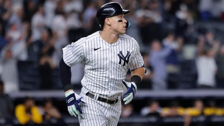 New York Yankees' Aaron Judge watches his 60th home run of the season, during the ninth inning of the team's baseball game against the Pittsburgh Pirates on Tuesday, Sept. 20, 2022, in New York. (Jessie Alcheh/AP Photo)