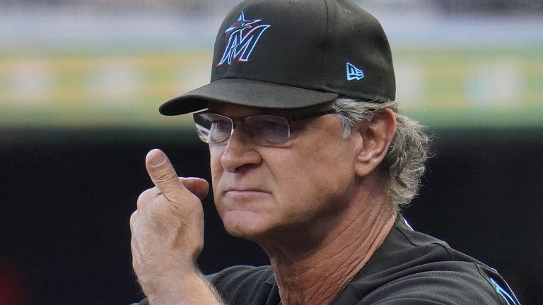 Miami Marlins manager Don Mattingly stands in the dugout during the first inning of a baseball game against the Pittsburgh Pirates in Pittsburgh, Saturday, July 23, 2022. (Gene J. Puskar/AP)