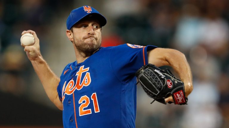 New York Mets starting pitcher Max Scherzer throws against the Washington Nationals during the first inning of a baseball game Saturday, Sept. 3, 2022, in New York. (Noah K. Murray/AP)