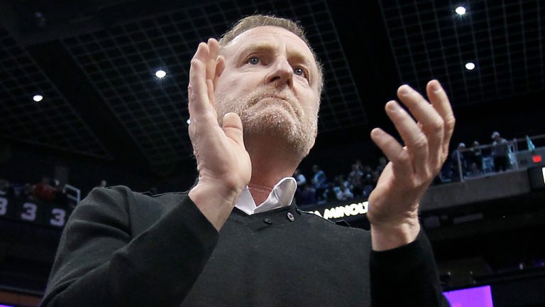 Phoenix Suns owner Robert Sarver applauds the teams 107-99 victory against the Minnesota Timberwolves during an NBA basketball game, Saturday, Dec. 15, 2018, in Phoenix. The NBA has suspended Phoenix Suns and Phoenix Mercury owner Robert Sarver for one year, plus fined him $10 million, after an investigation found that he had engaged in what the league called workplace misconduct and organizational deficiencies." The findings of the league's report, published Tuesday, Sept. 13, 2022, came nearly a year after the NBA asked a law firm to investigate allegations that Sarver had a history of racist, misogynistic and hostile incidents over his nearly two-decade tenure overseeing the franchise. (Ralph Freso/AP, File)