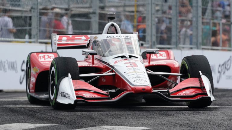 Scott McLaughlin drives through a turn during the Music City Grand Prix auto race Sunday, Aug. 7, 2022, in Nashville, Tenn. (Mark Humphrey/AP)