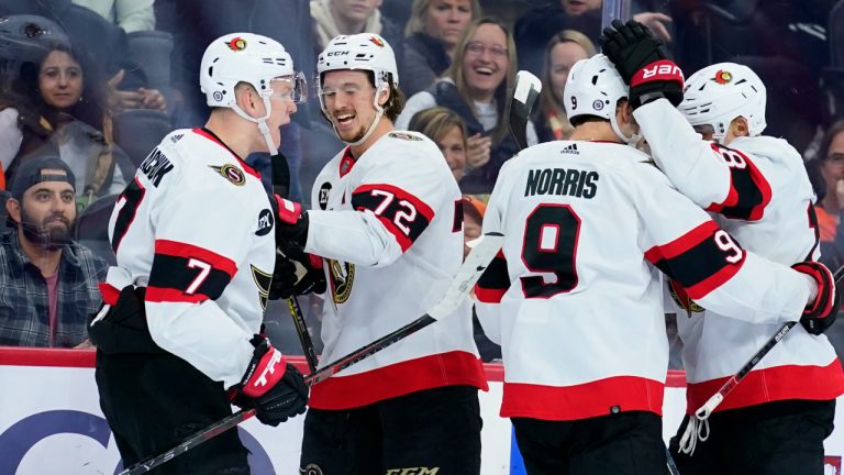 Ottawa Senators' Brady Tkachuk, from left, Thomas Chabot, Josh Norris and Tim Stutzle celebrate after Tkachuk's goal during the third period of an NHL hockey game. (Matt Slocum/AP)