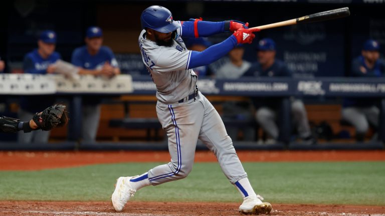 Toronto Blue Jays' Teoscar Hernandez hits a two-run home run against the Tampa Bay Rays during the eighth inning of a baseball game Sunday, Sept. 25, 2022, in St. Petersburg, Fla. (Scott Audette/AP)