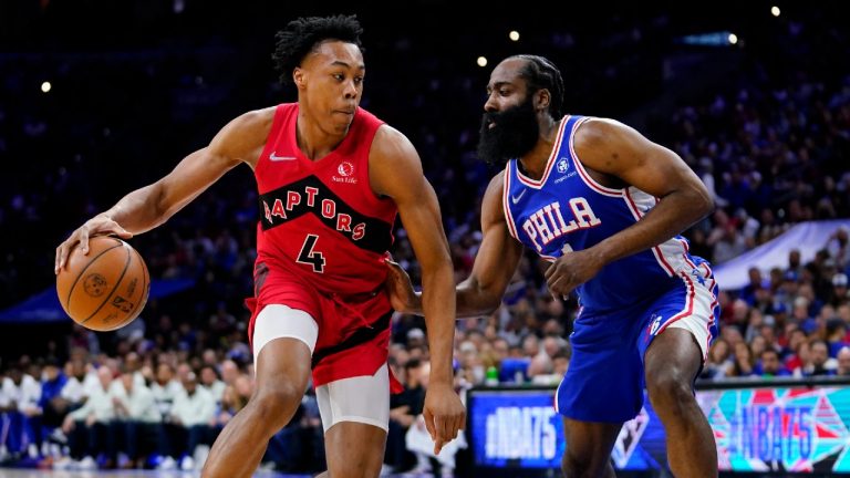 Toronto Raptors' Scottie Barnes, left, tries to get past Philadelphia 76ers' James Harden during the first half of Game 5 in an NBA basketball first-round playoff series, Monday, April 25, 2022, in Philadelphia. (Matt Slocum/AP)