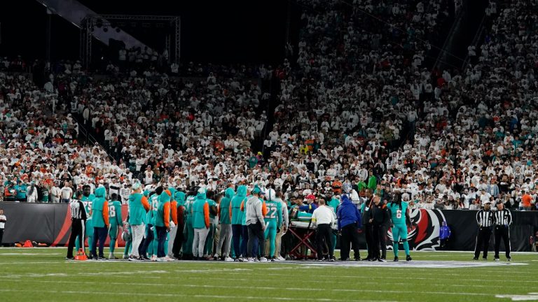 Miami Dolphins quarterback Tua Tagovailoa is taken off the field on a stretcher during the first half of an NFL football game against the Cincinnati Bengals, Thursday, Sept. 29, 2022, in Cincinnati. (Jeff Dean/AP Photo)