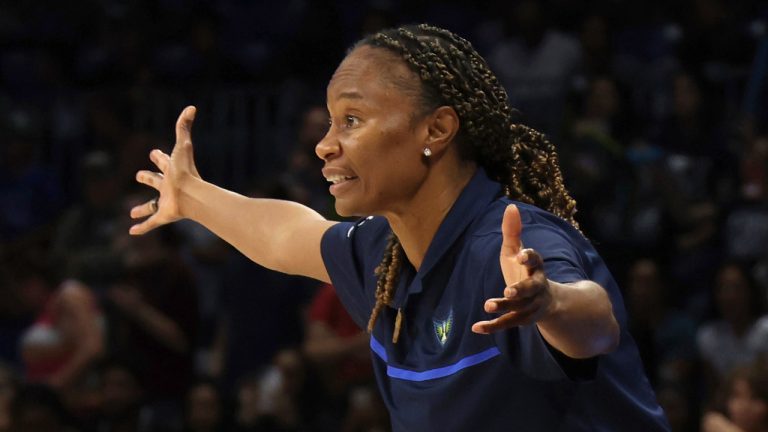 Dallas Wings head coach Vickie Johnson encourages her players during the overtime period of their 95-91 victory over Indiana Fever during a WNBA game at UT-Arlington's College Park Center in Arlington Saturday, Aug. 6, 2022. (Steve Hamm/The Dallas Morning News via AP)