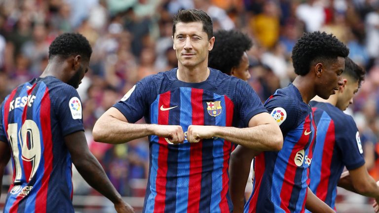 Barcelona's Robert Lewandowski celebrates after scoring the opening goal during a Spanish La Liga soccer match between FC Barcelona and Elche CF at Camp Nou stadium in Barcelona, Spain, Saturday, Sept. 17, 2022. (Joan Monfort/AP)