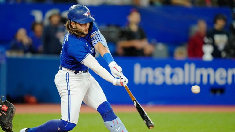 Toronto Blue Jays' Bo Bichette (11) hits an RBI single against the Tampa Bay Rays during third inning MLB action in Toronto, Wednesday, Sept. 14, 2022. (Frank Gunn/CP)