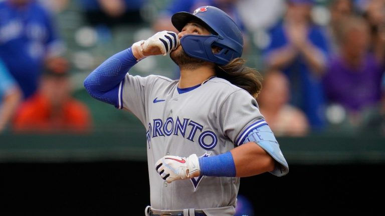 Toronto Blue Jays' Bo Bichette reacts after hitting a three-run home run off Baltimore Orioles relief pitcher Nick Vespi during the third inning of the second game of a baseball doubleheader, Monday, Sept. 5, 2022, in Baltimore. Blue Jays' Jackie Bradley Jr. and George Springer scored on the home run. (Julio Cortez/AP)