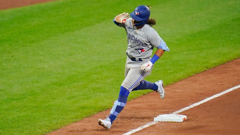 Toronto Blue Jays' Bo Bichette runs the bases after hitting a solo home run against the Baltimore Orioles during the seventh inning of the second game of a baseball doubleheader, Monday, Sept. 5, 2022, in Baltimore. (Julio Cortez/AP)