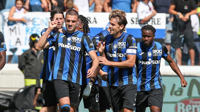 Atalanta's Merih Demiral, left, celebrates with teammates after scoring celebrates with teammates after scoring his side's first goal during the Italian Serie A soccer match between Atalanta and Cremonese, at the Gewiss Stadium in Bergamo, Italy, Sunday, Sept. 11, 2022. (StefanoNicoli/LaPresse via AP)