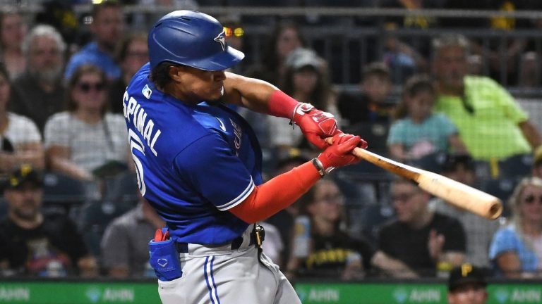 Toronto Blue Jays' Santiago Espinal hits a two-run double. (Philip G. Pavely/AP)