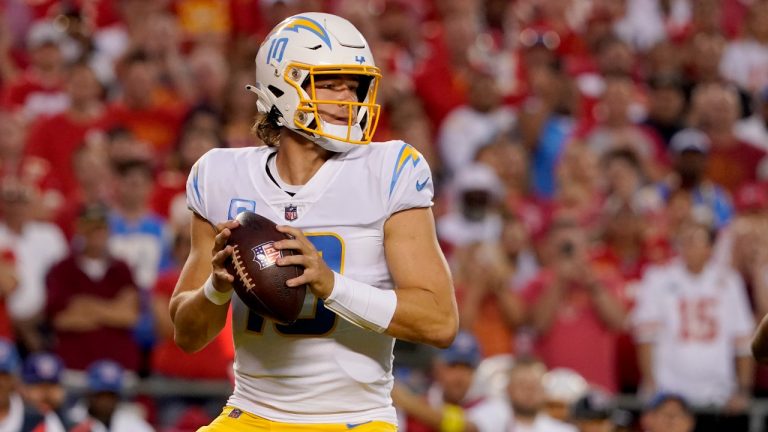 Los Angeles Chargers quarterback Justin Herbert drops back to pass during the first half of an NFL football game against the Kansas City Chiefs Thursday, Sept. 15, 2022, in Kansas City, Mo. (Ed Zurga/AP)