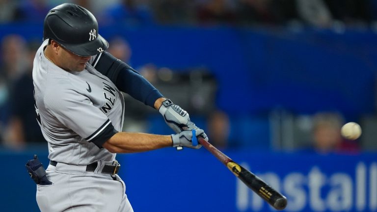 New York Yankees shortstop Isiah Kiner-Falefa (12) hits a solo homer during second inning American League MLB baseball action against the Toronto Blue Jays in Toronto on Monday, September 26, 2022. (Nathan Denette/CP)