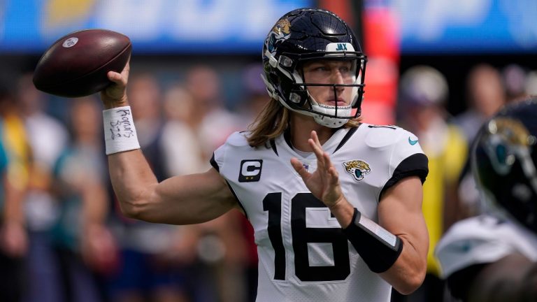 Jacksonville Jaguars quarterback Trevor Lawrence (16) passes against the Los Angeles Chargers during the first half of an NFL football game in Inglewood, Calif., Sunday, Sept. 25, 2022. (Mark J. Terrill/AP)