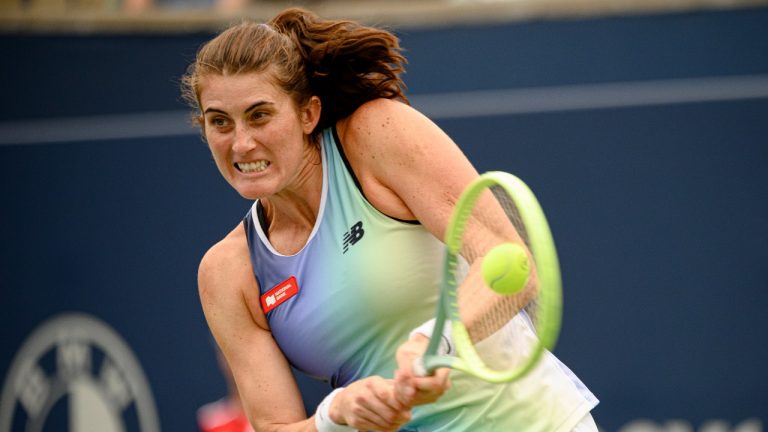 Vancouver’s Rebecca Marino returns the ball to Qinwen Zheng, of China during the National Bank Open tennis tournament in Toronto, on Aug. 9, 2022. Marino advanced to the third round of the U.S. Open with a 6-3, 7-6 (5) win over Ukraine's Daria Snigur on Wednesday. (Christopher Katsarov/CP)