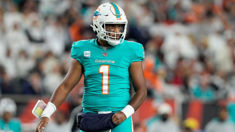 Miami Dolphins quarterback Tua Tagovailoa looks to the sidelines during the first half of an NFL football game against the Cincinnati Bengals, Thursday, Sept. 29, 2022, in Cincinnati. Tagovailoa suffered a second frightening injury in five days when he was carted off the field Thursday. (Jeff Dean/AP)