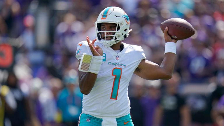 Miami Dolphins quarterback Tua Tagovailoa (1) aims a pass during the first half of an NFL football game against the Baltimore Ravens, Sunday, Sept. 18, 2022, in Baltimore. (Julio Cortez/AP)