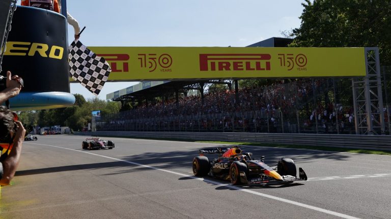 Red Bull driver Max Verstappen of the Netherlands crosses the finish line to win the Italian Grand Prix race at the Monza racetrack, in Monza, Italy, Sunday, Sept. 11, 2022. (Ciro De Luca, Pool via AP)