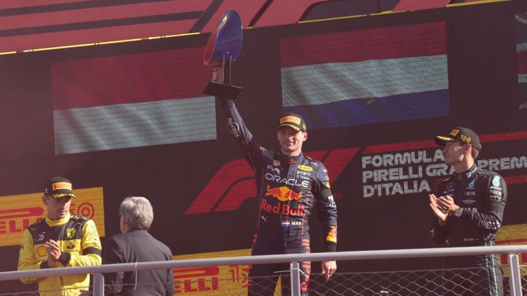 Red Bull driver Max Verstappen of the Netherlands celebrates on the podium after winning the Italian Grand Prix race at the Monza racetrack, in Monza, Italy, Sunday, Sept. 11, 2022. (Antonio Calanni/AP)