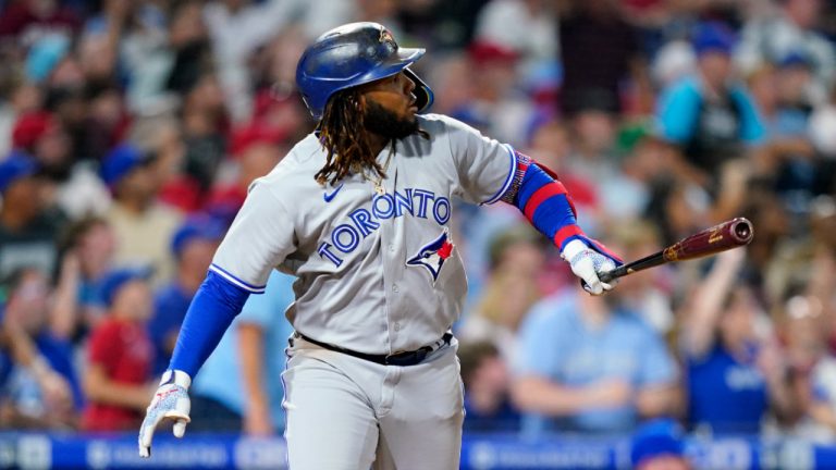 Toronto Blue Jays' Vladimir Guerrero Jr. watches after hitting a three-run home run against Philadelphia Phillies pitcher Seranthony Dominguez during the eighth inning of a baseball game, Wednesday, Sept. 21, 2022, in Philadelphia. (Matt Slocum/AP) 