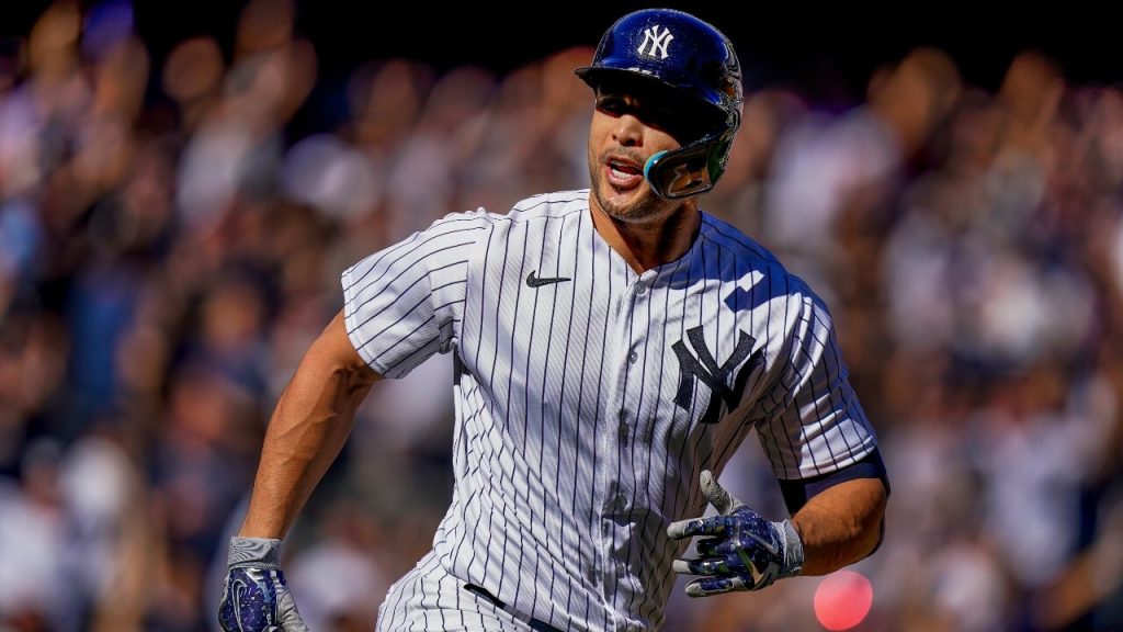 Here is Giancarlo Stanton and his muscles covered in paint