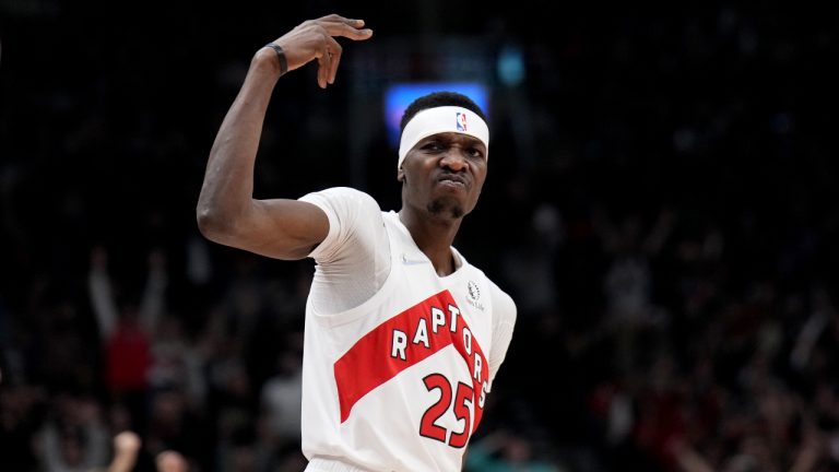 Toronto Raptors forward Chris Boucher (25) celebrates after draining a 3 pointer during first half NBA first round playoff action against the Philadelphia 76ers in Toronto on Wednesday April 20, 2022. (Nathan Denette/CP)