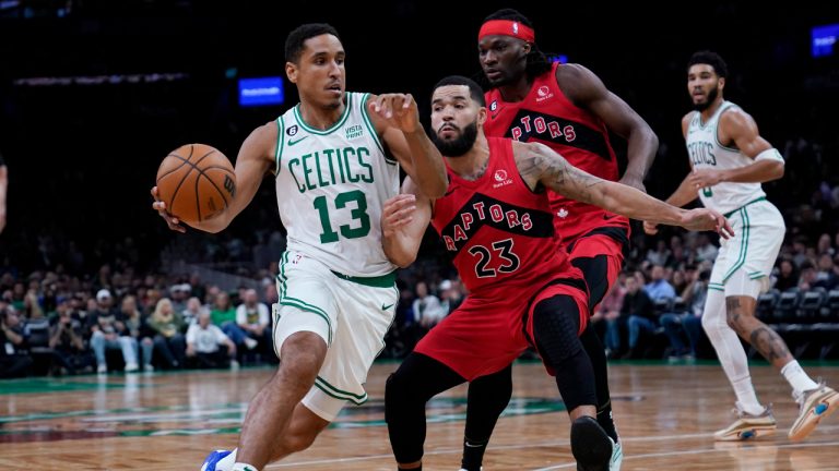 Boston Celtics guard Malcolm Brogdon (13) drives to the basket against Toronto Raptors guard Fred VanVleet (23) during the first half of an NBA preseason basketball game. (Charles Krupa/AP)