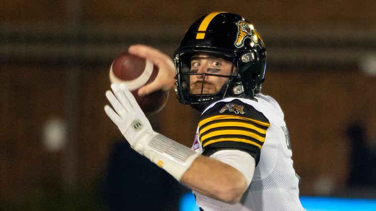 Hamilton Tiger-Cats quarterback Dane Evans sends the ball against the Hamilton Tiger-Cats during first half CFL football action in Montreal on Friday, Sept. 23, 2022. Evans and the Tiger-Cats could give their playoff hopes a boost by continuing their trend coming off a bye week.THE CANADIAN PRESS/Peter McCabe