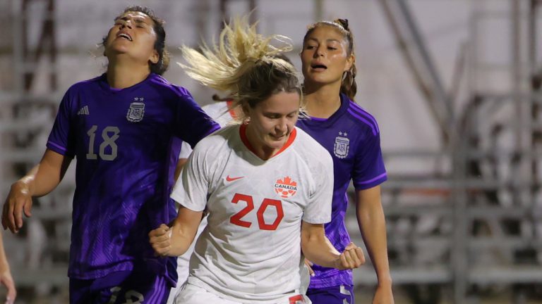 Canada's Cloe Lacasse, centre, celebrates after scoring her team's second goal during a women's international friendly soccer match between Canada and Argentina in Sanlucar de Barrameda, Spain, Thursday, Oct. 6, 2022. (AP Photo/Juan Carlos Toro del Rio)