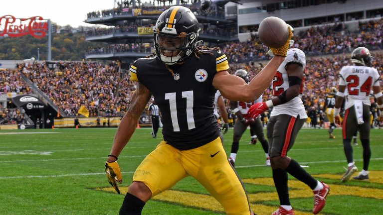 Pittsburgh Steelers wide receiver Chase Claypool (11) celebrates after his touchdown catch from quarterback Mitch Trubisky during the second half of an NFL football game in Pittsburgh, Sunday, Oct. 16, 2022. (Don Wright/AP Photo)